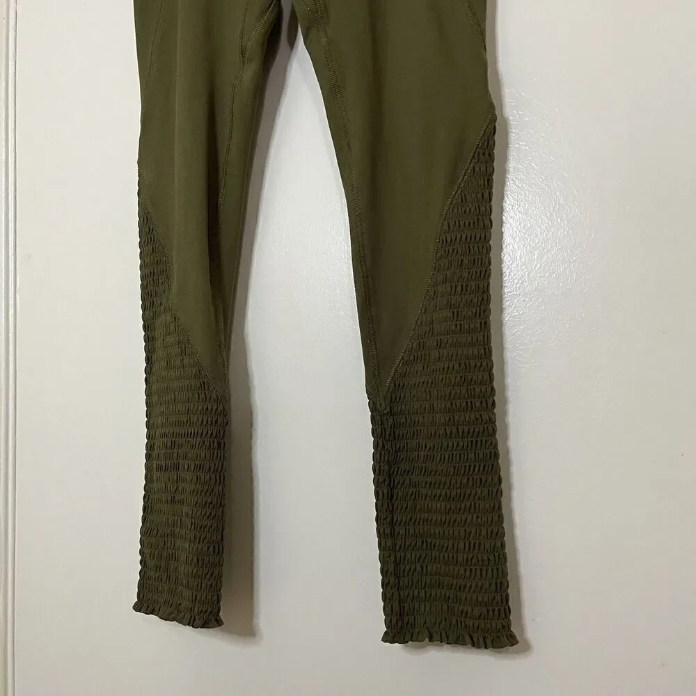 FP movement free people green high waist side pockets leggings size small
